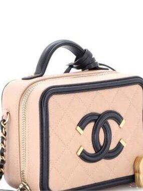 CHANEL Quilted Blush Mini Vanity Bag with Black Trim